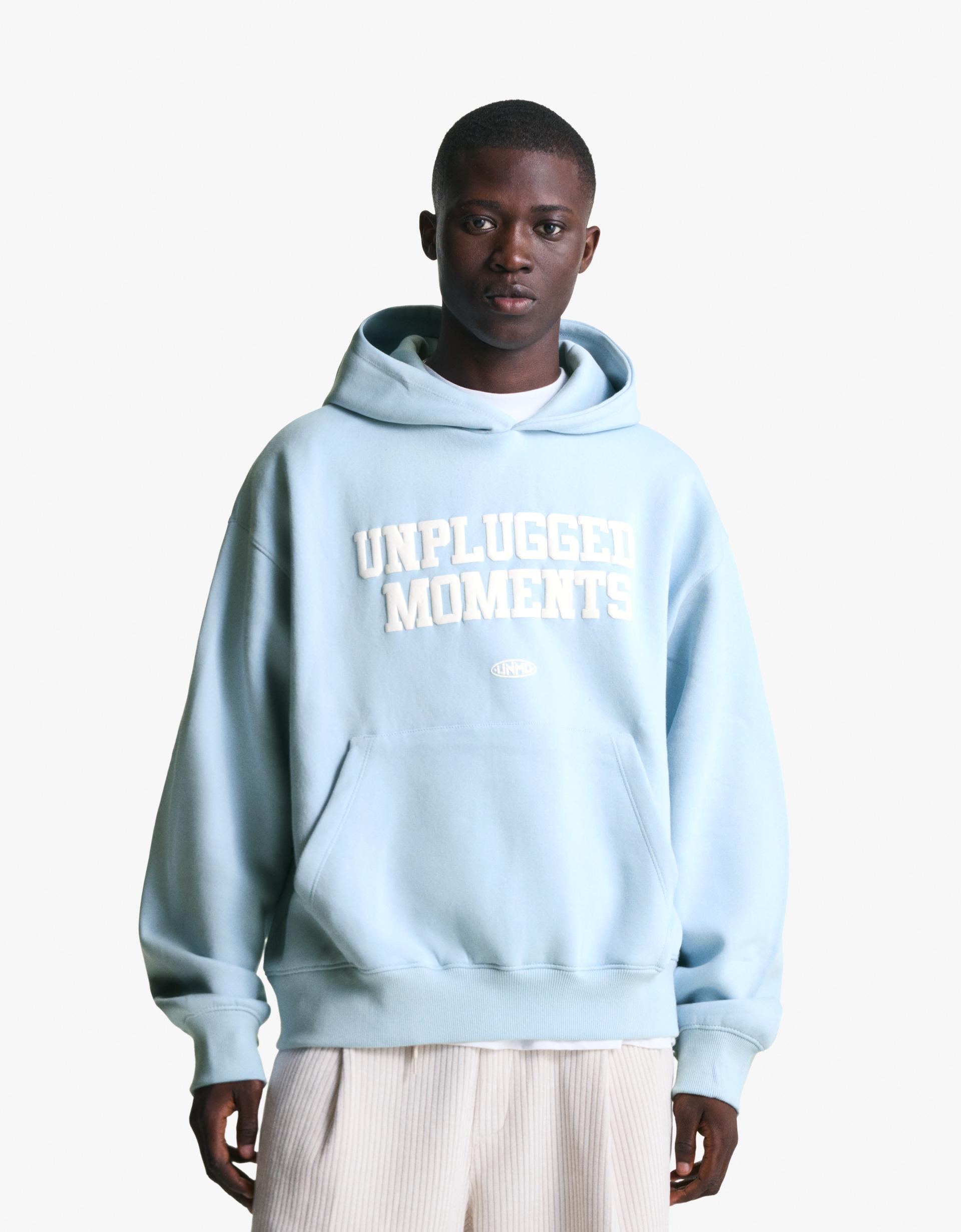 light blue "UNPLUGGED MOMENTS" hoodie in Bershka