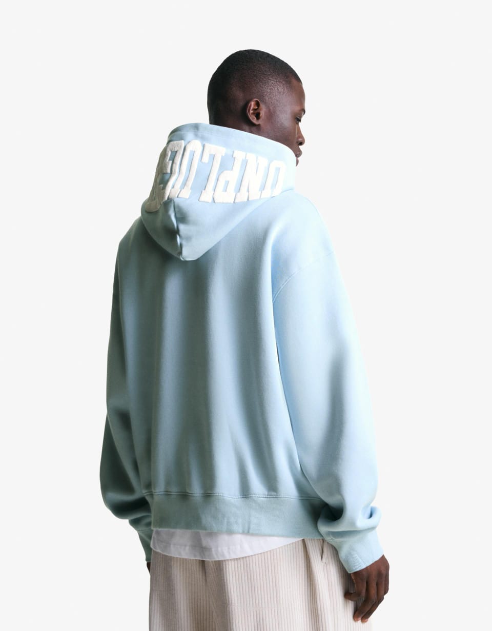 light blue "UNPLUGGED MOMENTS" hoodie in Bershka
